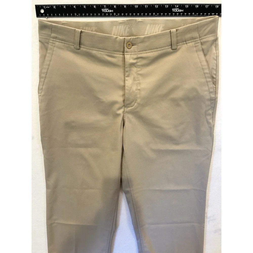 Nike Golf Dri-FIT Men's Performance Pants Khaki Tan Flat Front Size 34x27.5 Golf